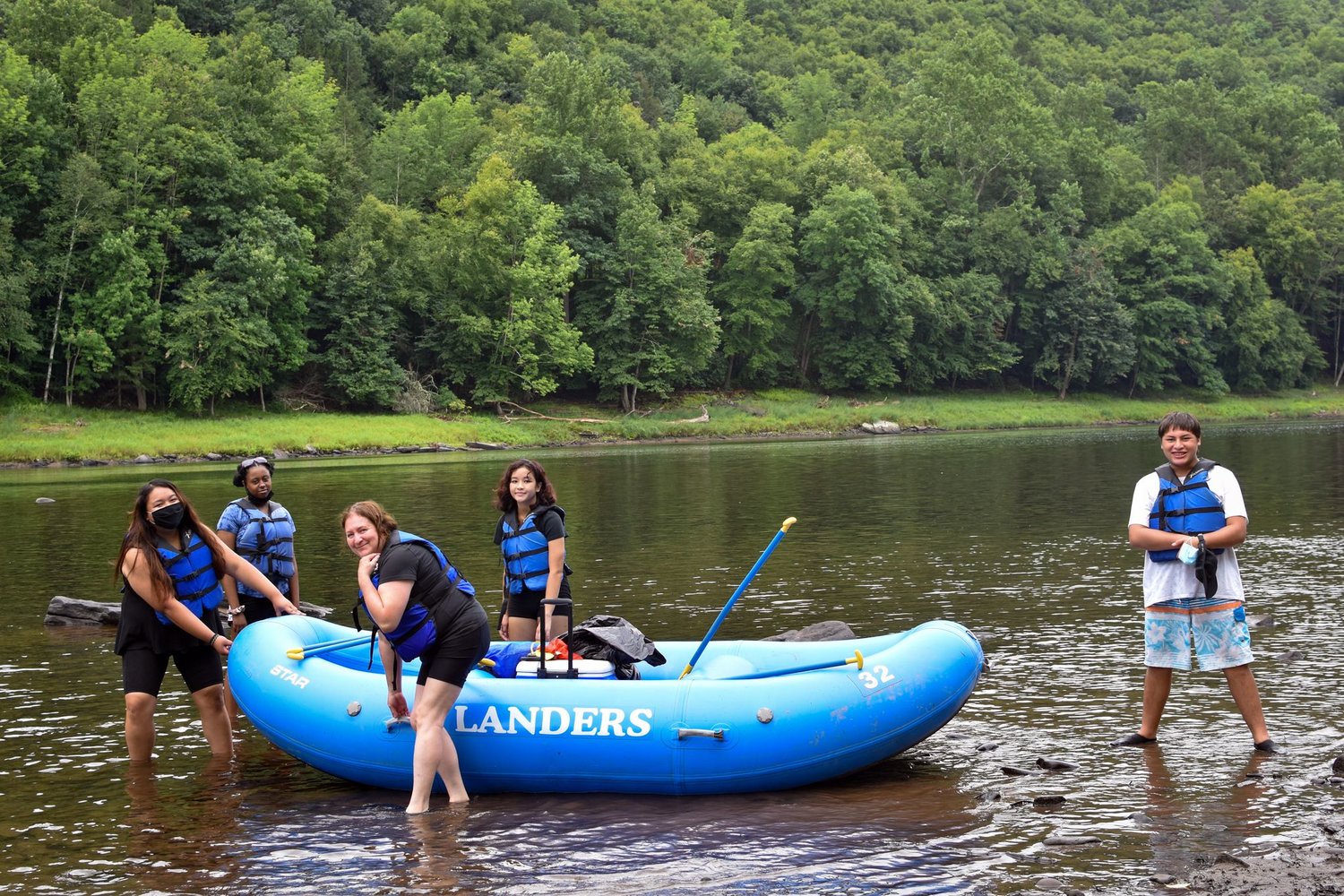 The Cabrera group from Middletown, NY brought 20 people along to the Upper Delaware Council’s Family Raft Trip. Pictured are Julianna Cabrera, left, Sarah Steed, Makayla Cabrera, Pattie Cabrera and Joseph Cabrera preparing to launch from Lander’s Minisink Base.